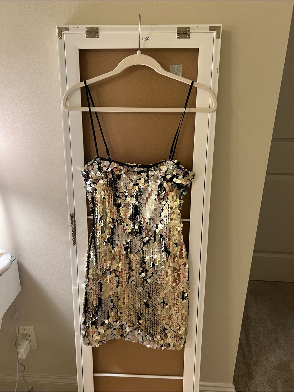 Likely gold dress